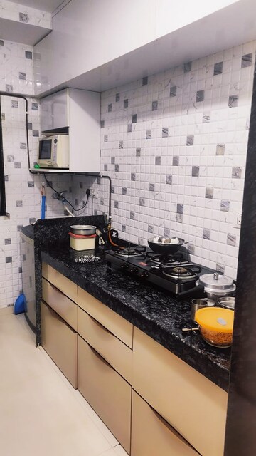 Kitchen in 1 BHK Apartment at Harshal Devchhaya, Dahisar East – for Sale