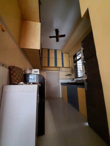 Kitchen in 2 BHK Apartment at Neelsidhi Residency, Kopar Khairane – for Sale