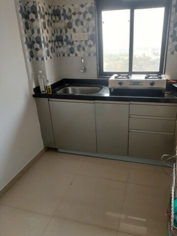 Kitchen in 1 BHK Apartment at Raunak City Sector 4, Kalyan West – for Sale