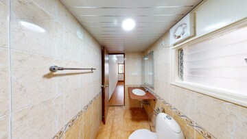 Bathroom in 3 BHK Apartment at Embassy Habitat, Palace Road – for Sale