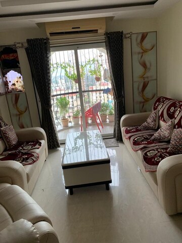 Living Room in 4 BHK Apartment at Balaji Garden CHS, Kopar Khairane – for Sale