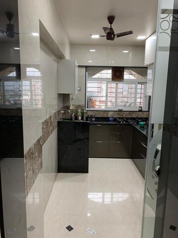 Kitchen in 4 BHK Apartment at Balaji Garden CHS, Kopar Khairane – for Sale