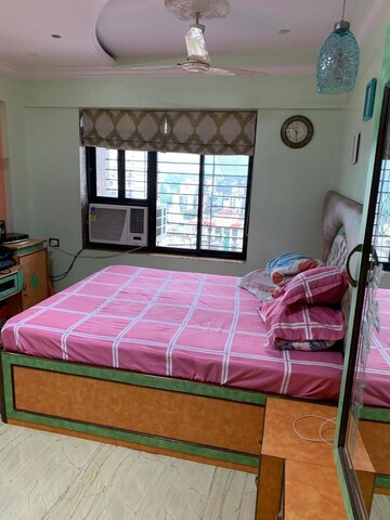 Bedroom in 4 BHK Apartment at Balaji Garden CHS, Kopar Khairane – for Sale