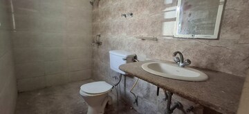 Bathroom in 2 BHK Apartment at NK Sharma Savitry Greens 2, Ghazipur – for Rent