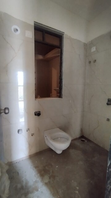Bathroom in 1 BHK Apartment at Raunak City Sector 4 D4, Kalyan West – for Sale
