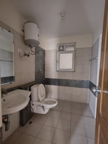 Bathroom in 3 BHK Apartment at Sushma Valencia, International Airport Road – for Rent
