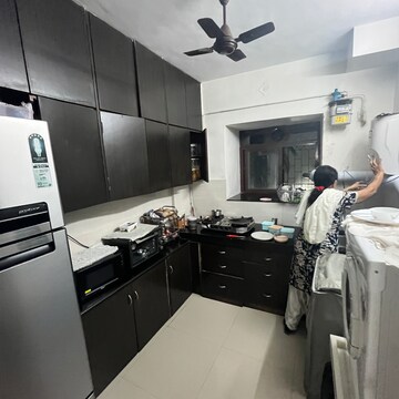 Team Area in 1 BHK Apartment at Exotic Palace, Yari Road – for Rent