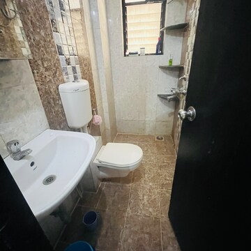 Bathroom in 2 BHK Apartment at Satyam Serenity, Pune East – for Rent