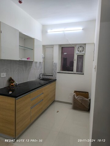 Kitchen in 2 BHK Apartment at Omkar Signet, Malad East – for Rent