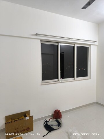Room in 2 BHK Apartment at Omkar Signet, Malad East – for Rent