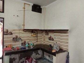 Kitchen in 1.5 BHK Independent House at Dwarka Mor – for Sale