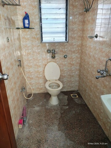 Bathroom in 2 BHK Apartment at Satellite Garden, Goregaon East – for Rent