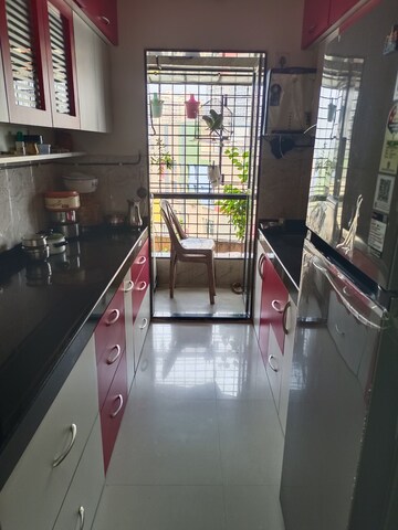 Kitchen in 2 BHK Apartment at Hubtown Greenwoods, Vartak Nagar – for Sale