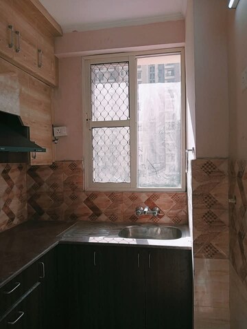 Kitchen in 3 BHK Apartment at Amrapali Golf Homes, Sector 4 Greater Noida – for Sale