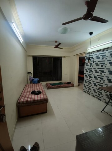 Living Room in 2 BHK Apartment at Woodsville Phase II, Moshi – for Rent