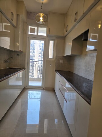 Kitchen in 3 BHK Apartment at Gaur Saundaryam, Tech Zone 4 Greater Noida – for Rent
