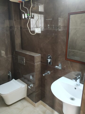 Bathroom in 2 BHK Apartment at Khirki Extension – for Rent