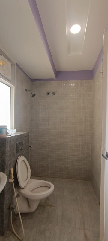 Bathroom in 3 BHK Apartment at Mahagun Mirabella, Sector 79 – for Sale
