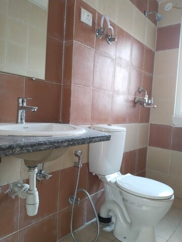 Bathroom in 2 BHK Apartment at Mahagun Mywoods, Sector 16c Greater Noida – for Rent