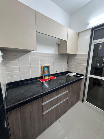 Kitchen in 1 BHK Apartment at JP North Alexa, Mira Road – for Rent