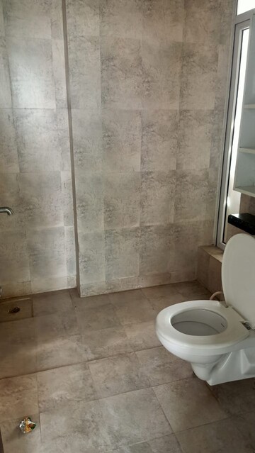 Bathroom in 3 BHK Apartment at Mahagun Mirabella, Sector 79 – for Rent