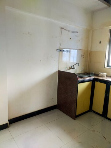 Kitchen in 2 BHK Apartment at Royal Palms, Goregaon East – for Rent