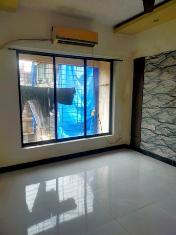 Room in 2 BHK Apartment at Royal Palms, Goregaon East – for Rent