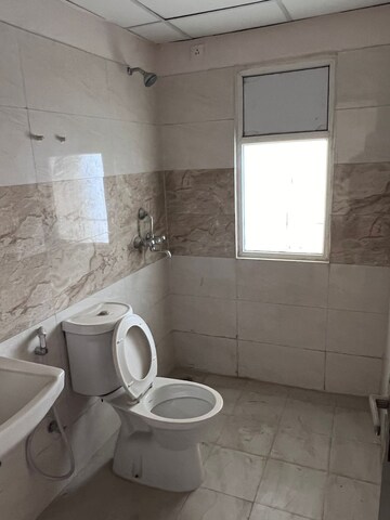 Bathroom in 2 BHK Apartment at Amrapali Golf Homes, Sector 4, Greater Noida – for Rent