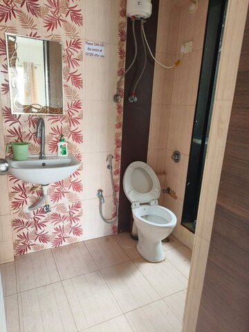 Bathroom in 4 BHK Apartment at Vidarbha Mahesh CHS, Kavesar – for Rent