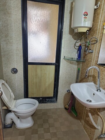 Bathroom in 4 BHK Apartment at Vidarbha Mahesh CHS, Kavesar – for Rent