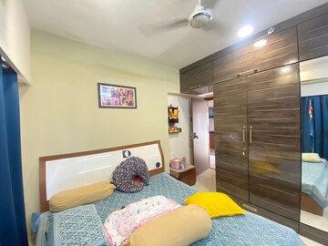 Bedroom in 2 BHK Apartment at Rizvi Cedar, Malad East – for Rent