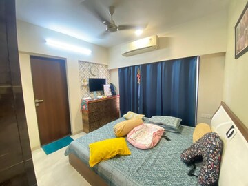 Bedroom in 2 BHK Apartment at Rizvi Cedar, Malad East – for Rent