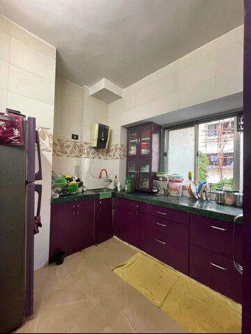 Kitchen in 2 BHK Apartment at Tulja Bhavani CHS, Kopar Khairane – for Sale