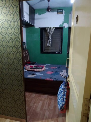 Bedroom in 1 BHK Apartment at Uma Smruti CHSL, Dombivli West – for Sale