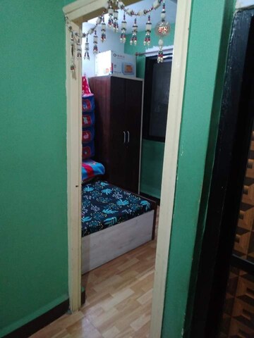 Master Bedroom in 1 BHK Apartment at Uma Smruti CHSL, Dombivli West – for Sale