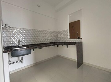 Kitchen in 2 BHK Apartment at Godrej Boulevard, Manjari – for Rent