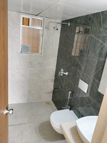 Bathroom in 1.5 BHK Apartment at Dosti West County Phase 2 Dosti Cedar, Balkum Pada – for Rent
