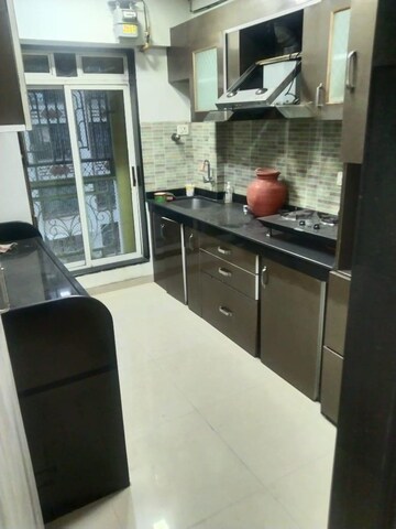Kitchen in 3 BHK Apartment at Deonar Apartments, Chembur – for Rent