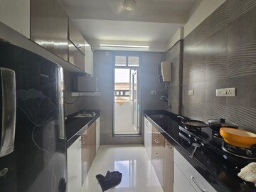 Kitchen in 2 BHK Apartment at Kalpataru Paramount, Kapur Bawdi – for Rent