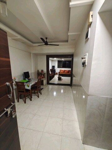 Living Room in 1 BHK Apartment at Nikita CHS, Ghansoli – for Sale