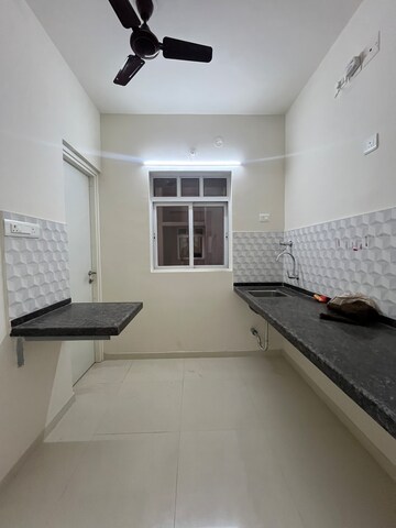 Kitchen in 1 BHK Apartment at Godrej Green Cove, Mahalunge – for Rent