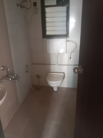 Bathroom in 1 BHK Apartment at Runwal Pearl, Manpada – for Rent