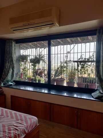 Bedroom in 2 BHK Apartment at Cosmic Heights, Wadala – for Rent