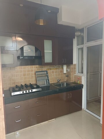 Kitchen in 4 BHK Apartment at Mahagun Mywoods, Sector 16c Greater Noida – for Rent