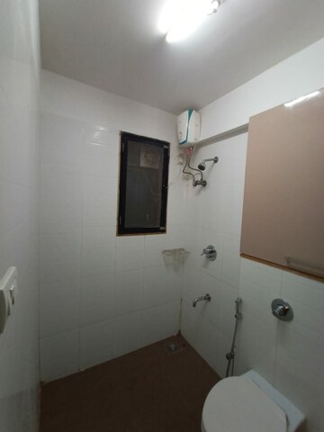 Bathroom in 2 BHK Apartment at Runwal Gardens, Dombivli East – for Rent