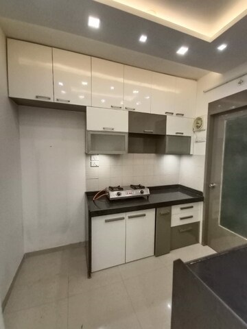 Kitchen in 2 BHK Apartment at Runwal Gardens, Dombivli East – for Rent
