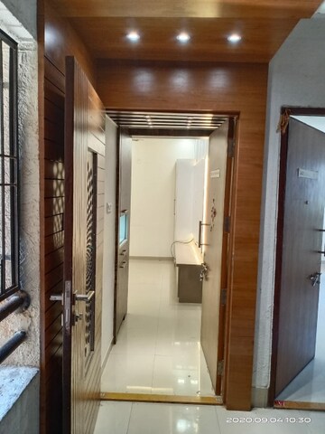 Building Lobby in 2 BHK Apartment at Runwal Gardens, Dombivli East – for Rent