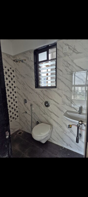 Bathroom in 1 BHK Apartment at UK Luxecity, Kandivali East – for Rent