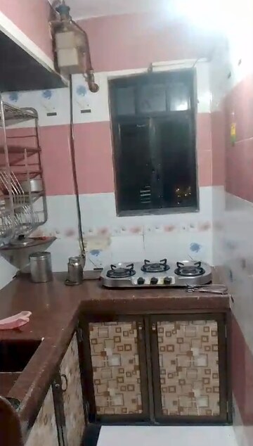 Living Room in 1 BHK Apartment at Kondivita Apartment, Andheri East – for Rent
