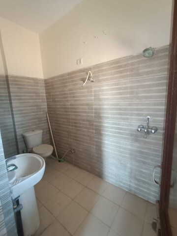 Bathroom in 3 BHK Apartment at Dhakoli Village – for Rent